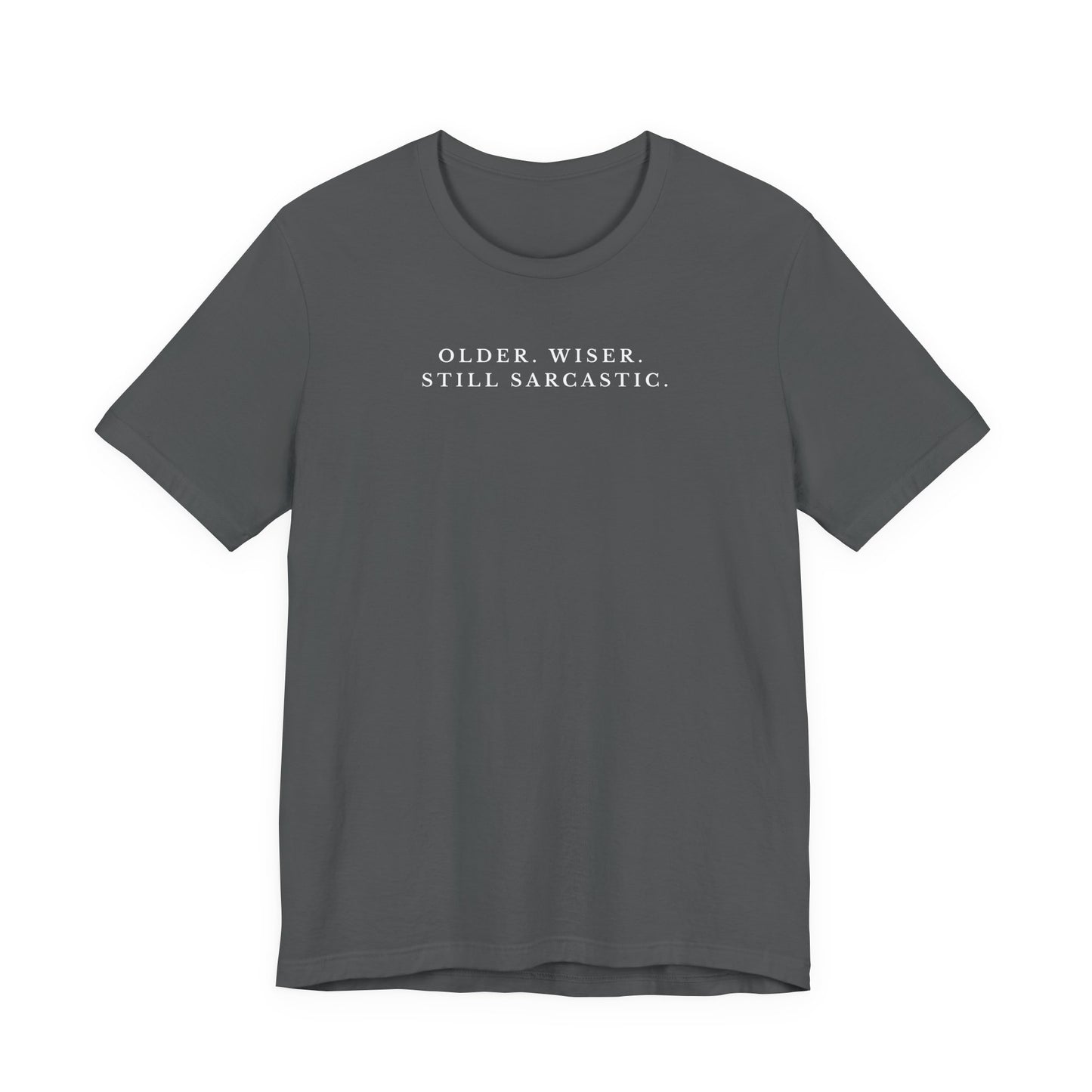 Gray t-shirt with white text saying "older. wiser. still sarcastic." on a white background