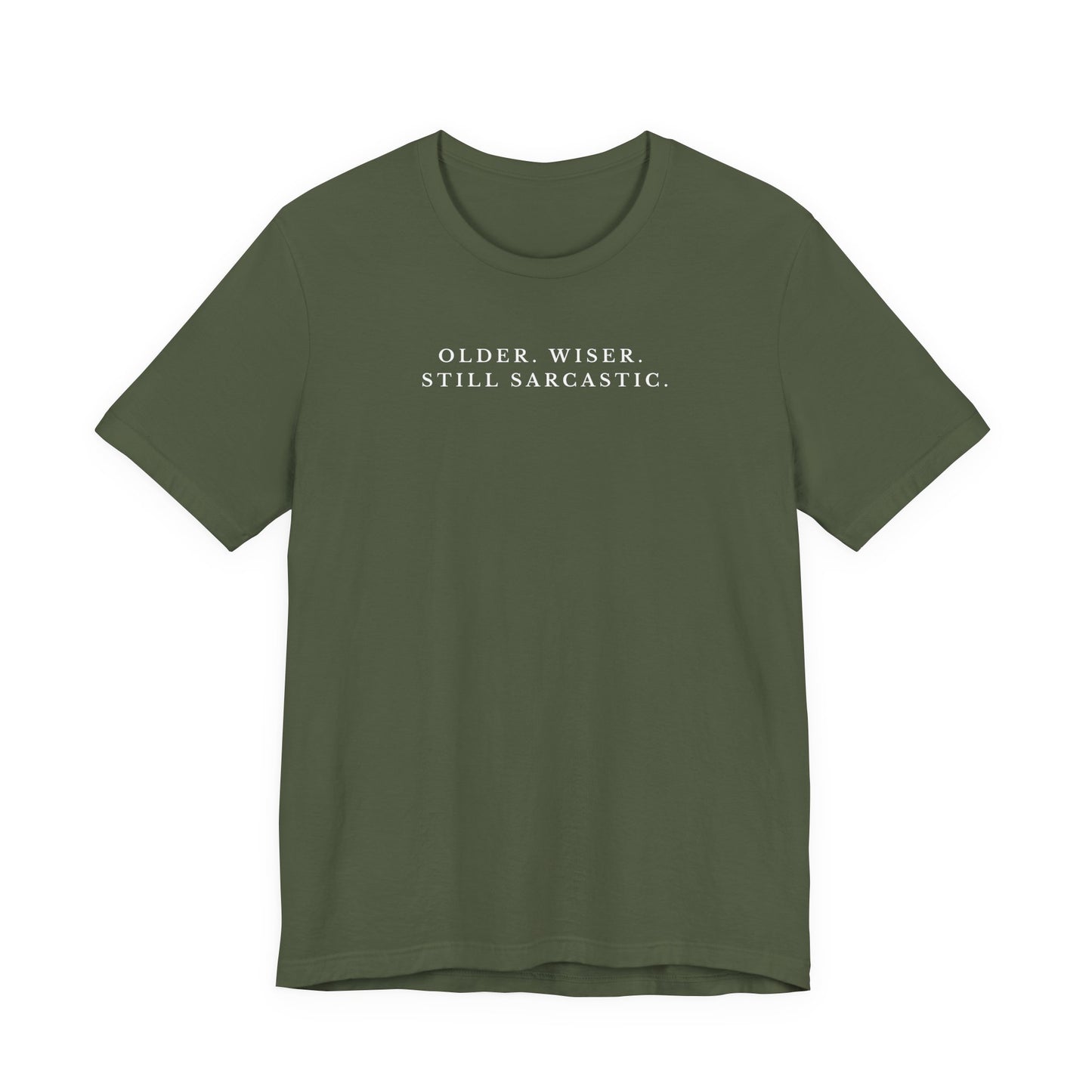 Green t-shirt with text 'OLDER. WISER. STILL SARCASTIC.' on a white background