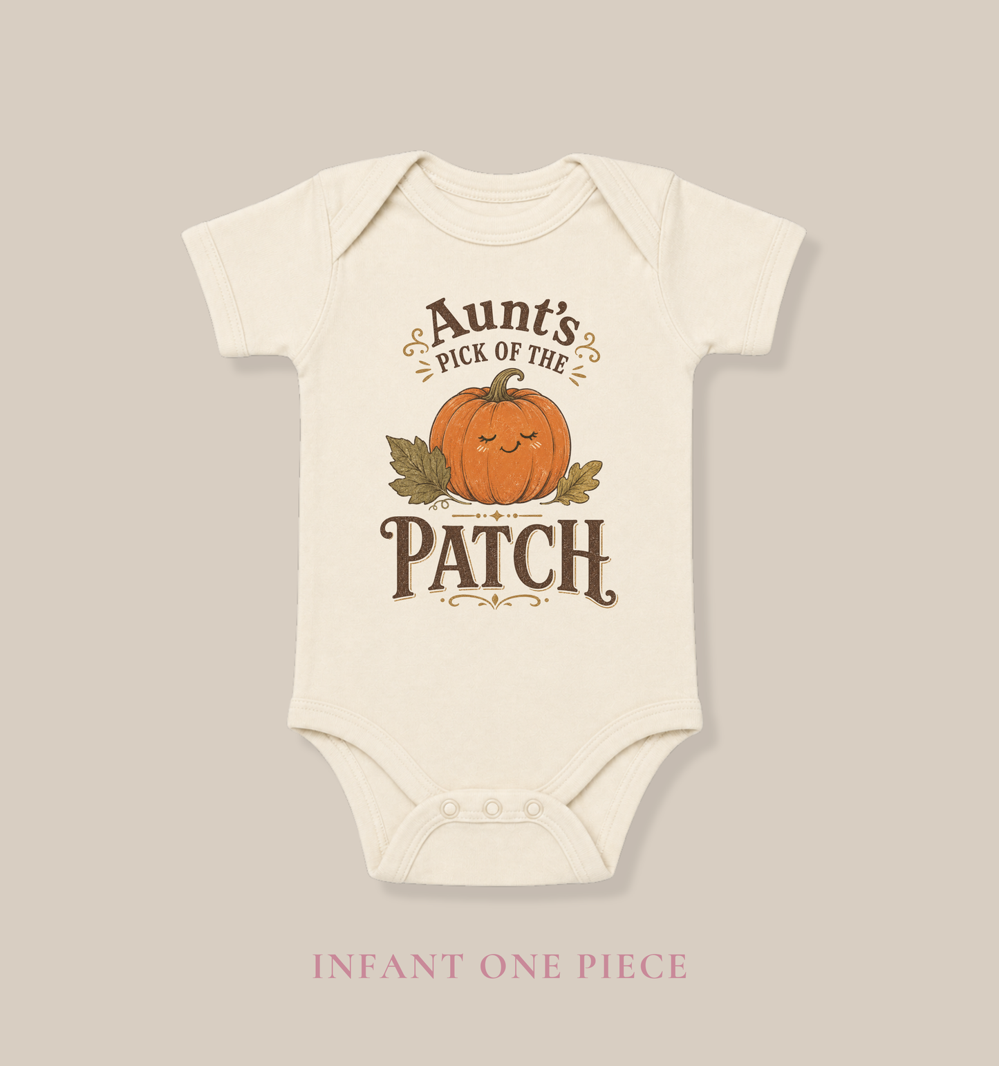 Natural baby one piece featuring a smiling pumpkin, autumn leaves, and the phrase “Aunt’s Pick of the Patch.”