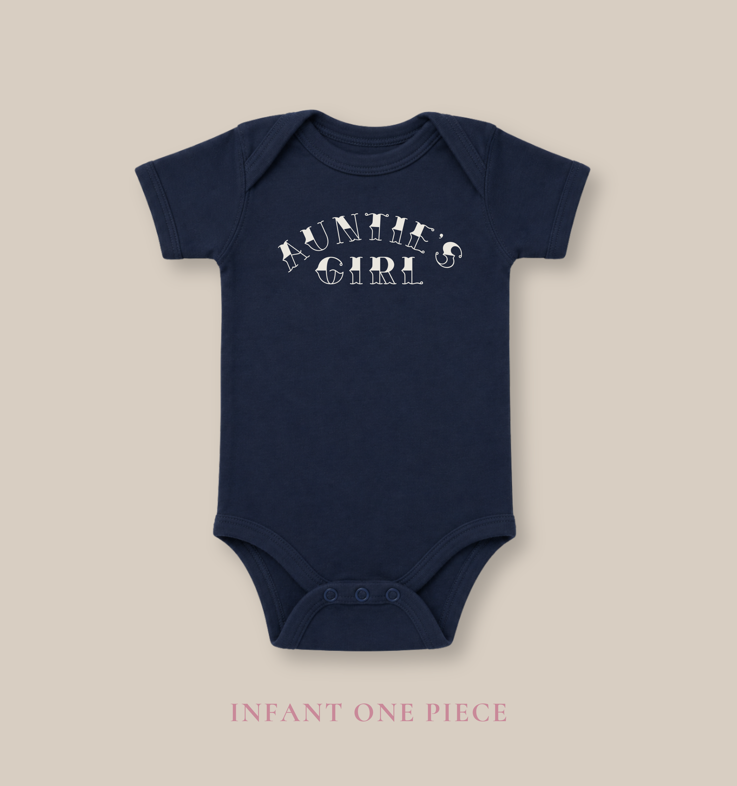 Navy Bella + Canvas 100B infant one piece featuring a cream “Auntie’s Girl” graphic in a playful western-inspired font for trendy baby outfits and matching family apparel.