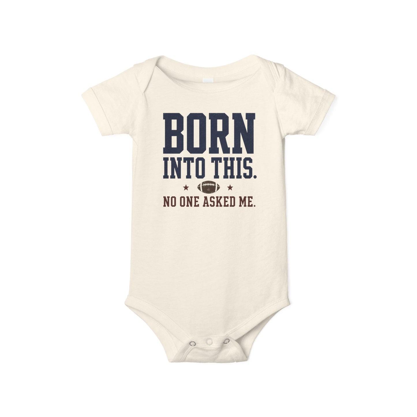 Natural Bella + Canvas 100B infant one piece featuring the phrase "Born Into This. No One Asked Me." with a football graphic. Soft neutral baby bodysuit for newborns and infants, ideal for football season, game days, baby showers, and future football fans.