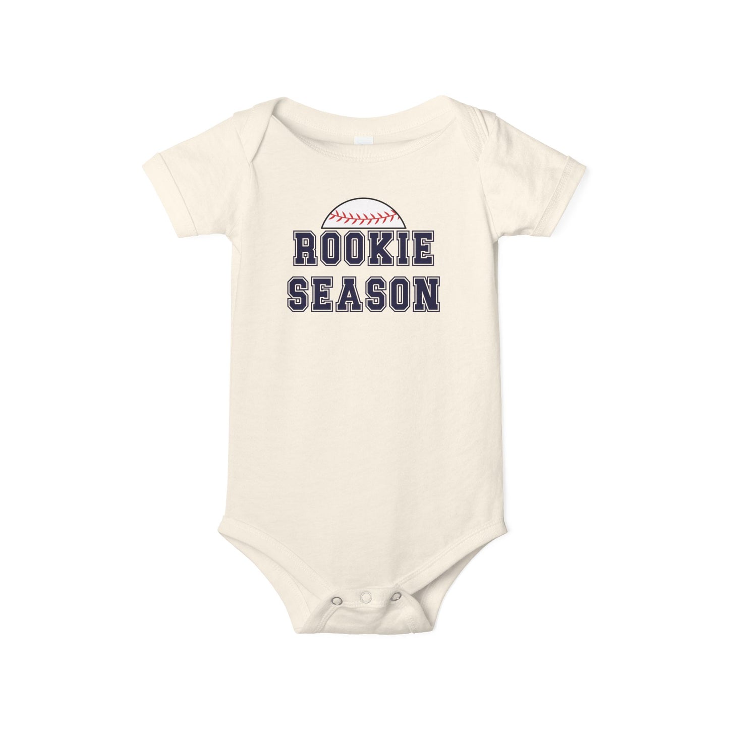 Bella + Canvas 100B natural infant bodysuit featuring a baseball graphic and "Rookie Season" text. Soft baseball baby outfit perfect for game days, baseball season, baby showers, newborn photos, and future little league fans.
