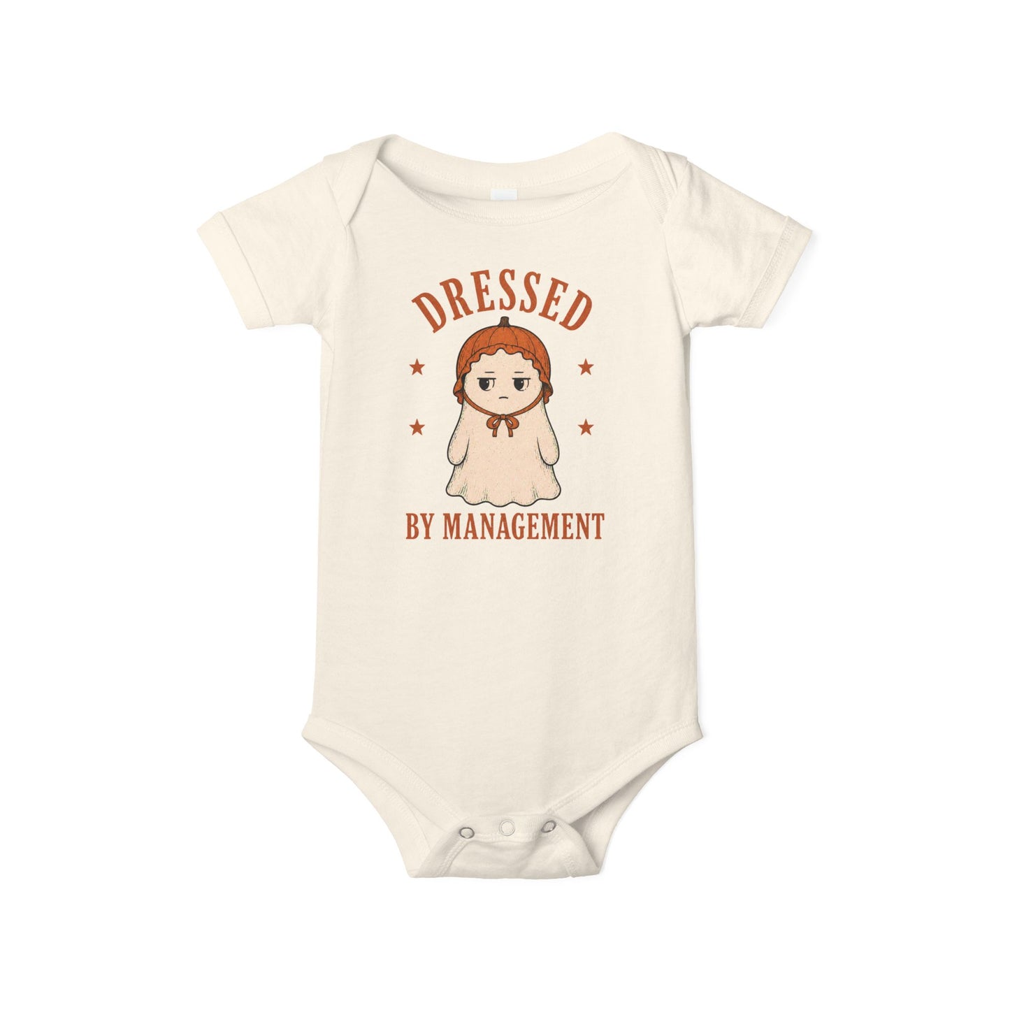 Bella + Canvas 100B infant one piece in Natural featuring a cute ghost wearing a pumpkin bonnet with the phrase "Dressed by Management." Adorable Halloween baby bodysuit perfect for newborns, infants, baby's first Halloween, autumn photos, pumpkin patch adventures, and fall celebrations.