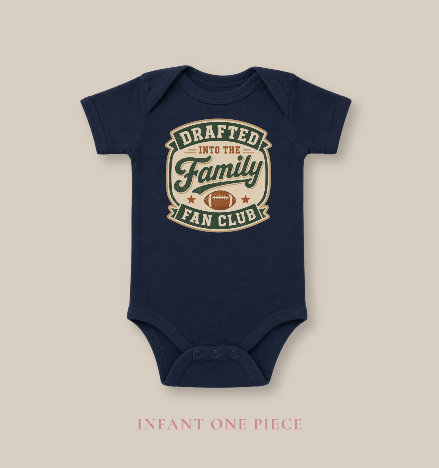 Bella + Canvas 100B infant one piece in Navy featuring the phrase "Drafted Into the Family Fan Club" with a vintage football badge design. Soft football-themed baby bodysuit perfect for newborns, infants, baby's first football season, game days, tailgates, baby showers, football-loving families, and new sports fans.