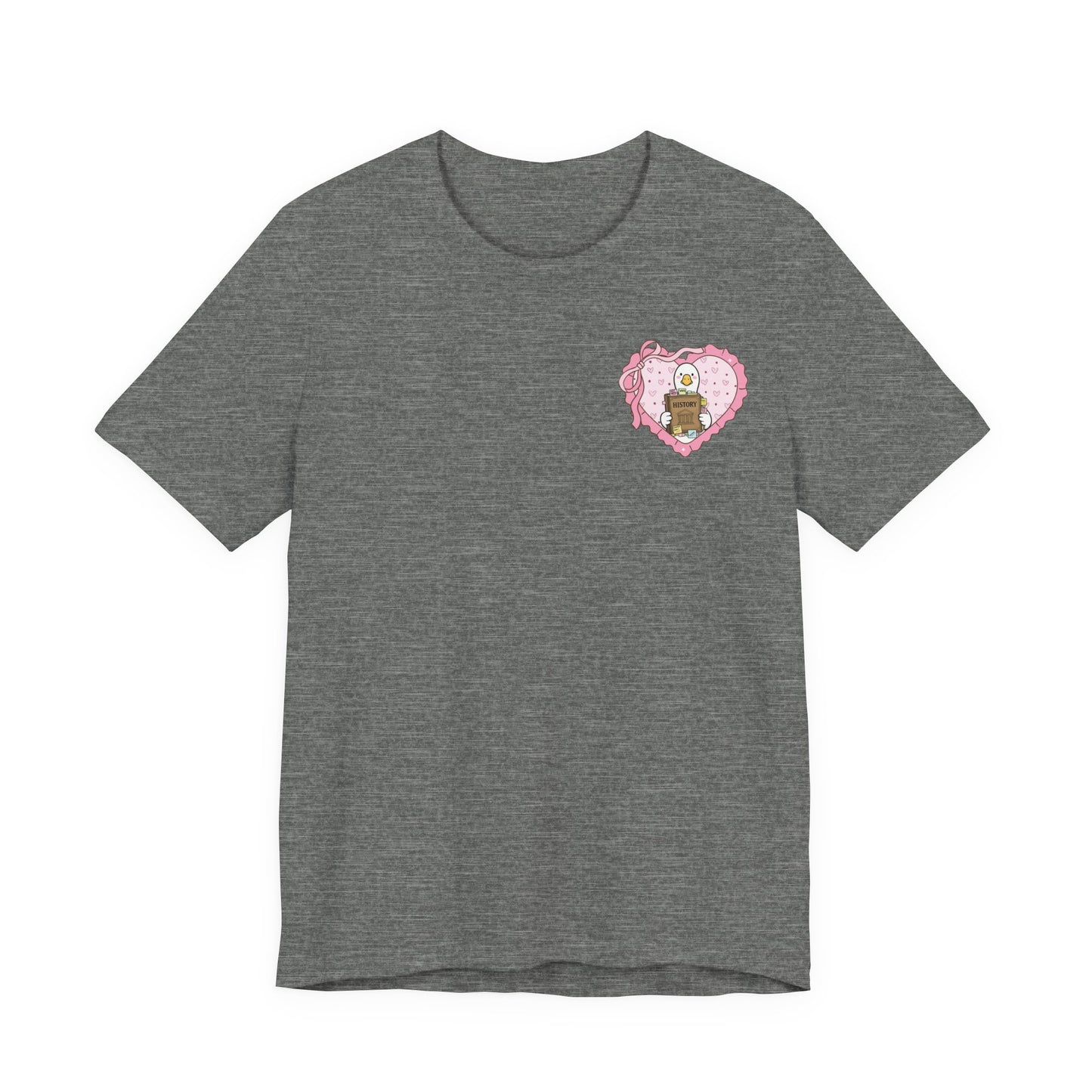 Bella + Canvas 3001 t-shirt in Dark Grey Heather featuring a coquette history teacher goose heart design on the left chest. White goose holding a history book inside a pink heart with bow accents. Great for history teachers, social studies teachers, and classroom wear.