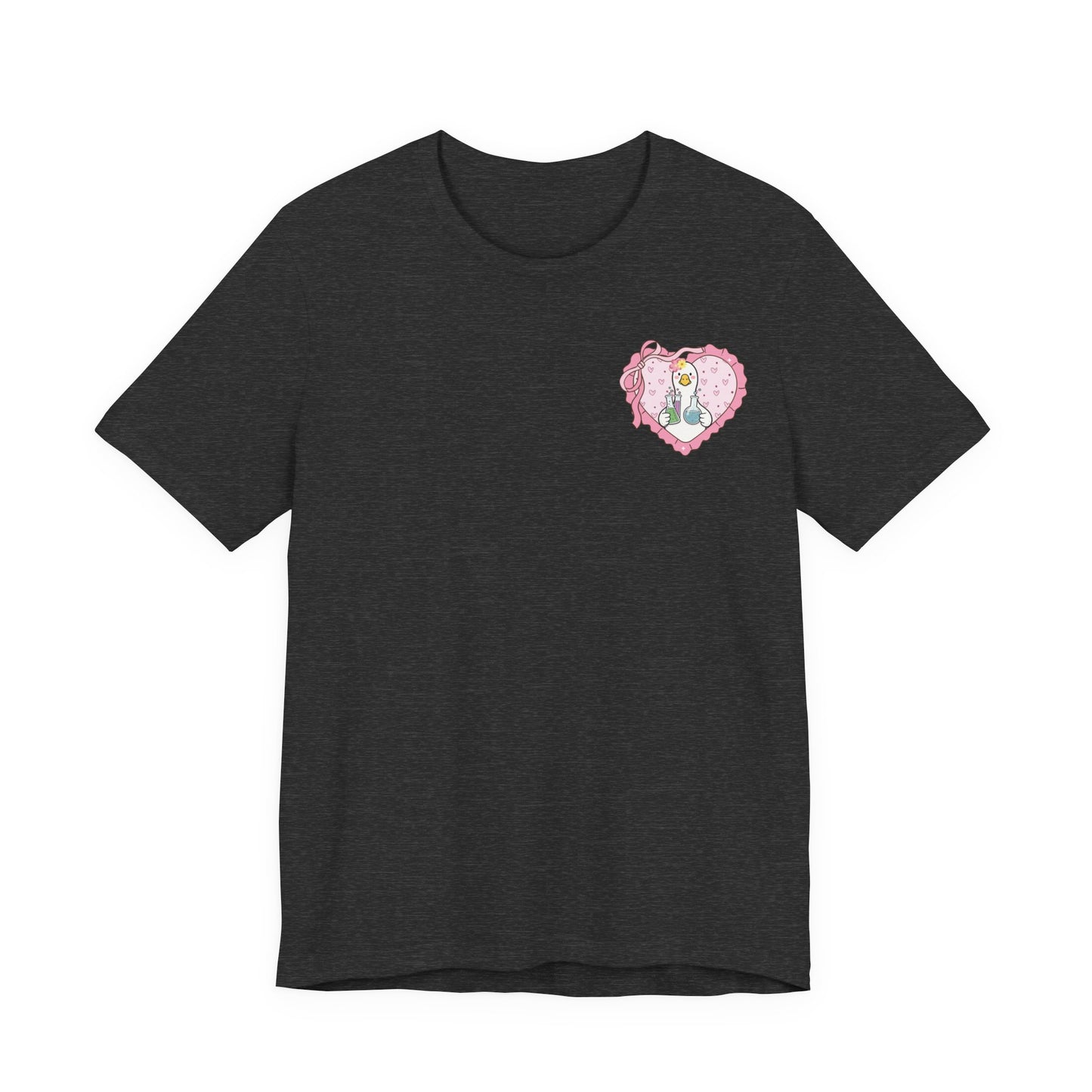 Bella + Canvas 3001 t-shirt in Dark Grey Heather featuring a coquette science teacher goose heart design on the left chest. White goose with laboratory beakers inside a pink heart with bow accents. Great for science teachers, STEM educators, and classroom wear.