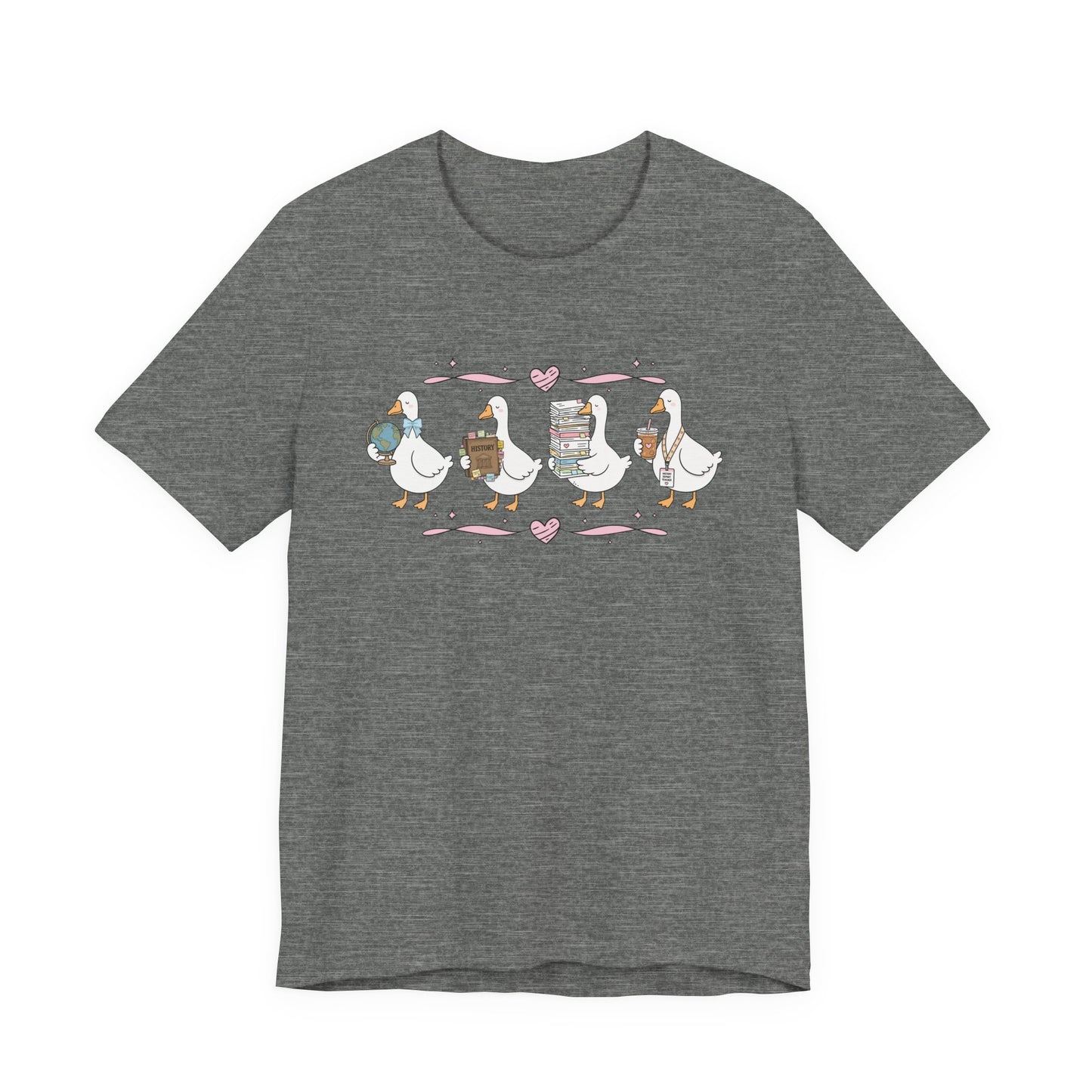 Bella + Canvas 3001 t-shirt in Deep Heather featuring a coquette history teacher goose design. Four white geese carry a globe, history textbook, stack of classroom papers, and iced coffee with a history teacher lanyard. Pink hearts and ribbon accents add a whimsical touch, making this cute history teacher shirt perfect for back-to-school outfits, teacher appreciation gifts, and everyday classroom wear.