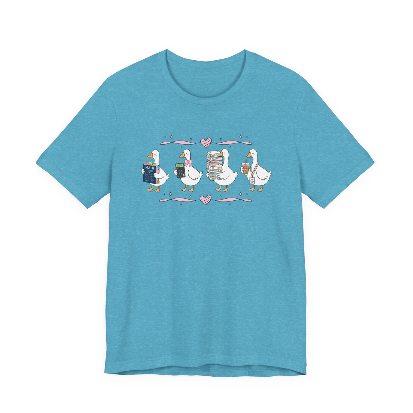 Bella + Canvas 3001 t-shirt in Heather Aqua featuring a coquette math teacher goose design. Four white geese carry a math textbook, calculator, stack of papers, and iced coffee with a teacher lanyard. Pink bows and heart accents add a playful touch. This cute math teacher shirt is perfect for math educators, back-to-school outfits, teacher appreciation gifts, and everyday classroom wear.