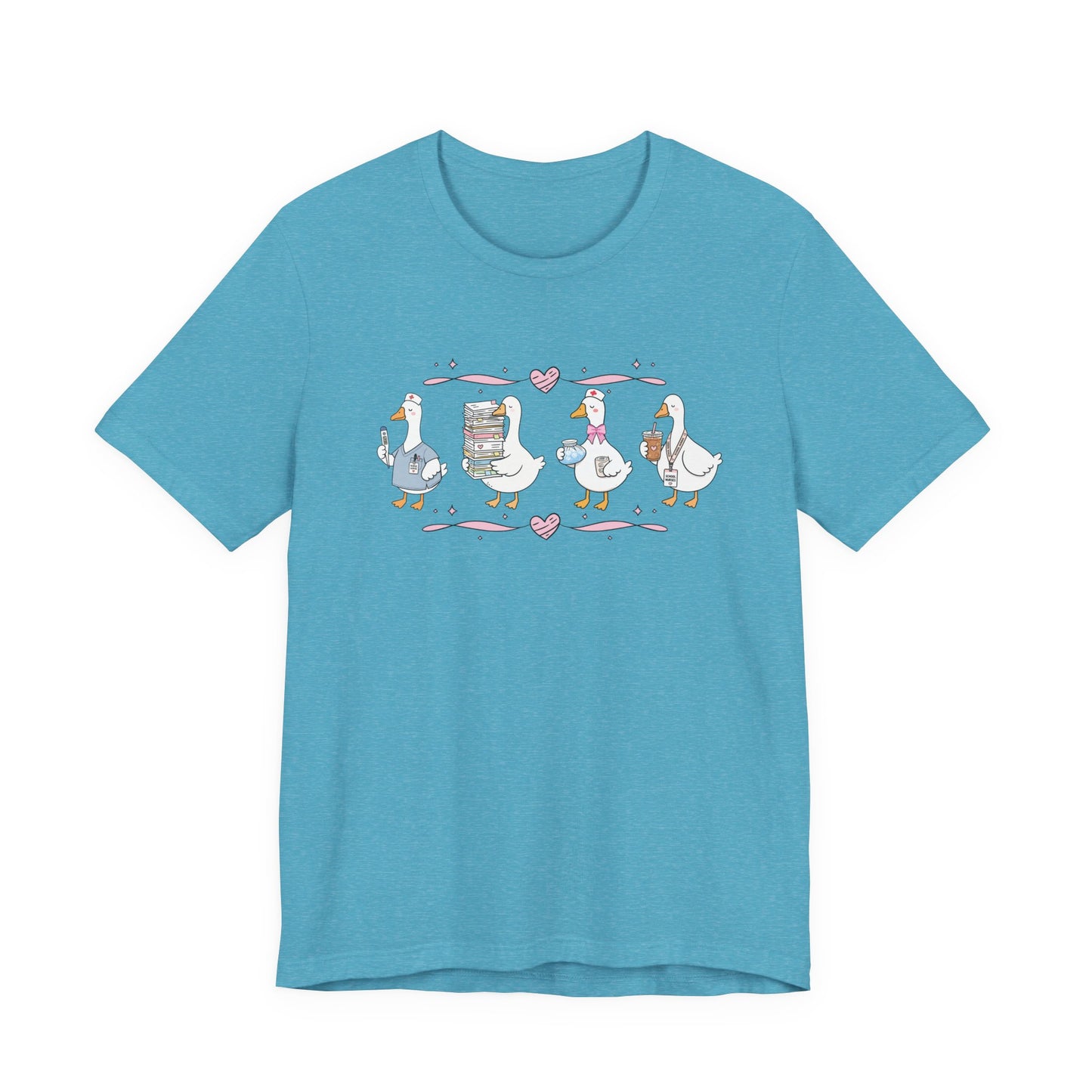 Bella + Canvas 3001 t-shirt in Heather Aqua featuring a coquette school nurse goose design. Four white geese display nurse-themed accessories including scrubs, a thermometer, medical supplies, paperwork, iced coffee, and a school nurse badge. Pink hearts and ribbon accents create a playful and whimsical aesthetic, making this cute school nurse shirt perfect for school nurses, healthcare workers, nurse appreciation gifts, medical staff, and back-to-school outfits.