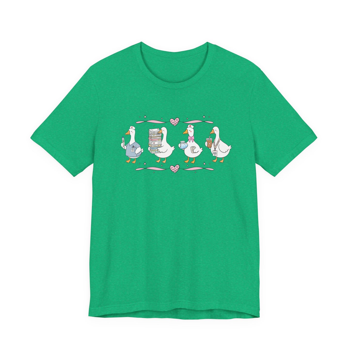 Bella + Canvas 3001 t-shirt in Heather Kelly featuring a coquette school nurse goose design. Four white geese display nurse-themed accessories including scrubs, a thermometer, medical supplies, paperwork, iced coffee, and a school nurse badge. Pink hearts and ribbon accents add a whimsical touch, making this cute school nurse shirt perfect for school nurses, healthcare workers, nurse appreciation gifts, medical staff, and back-to-school outfits.
