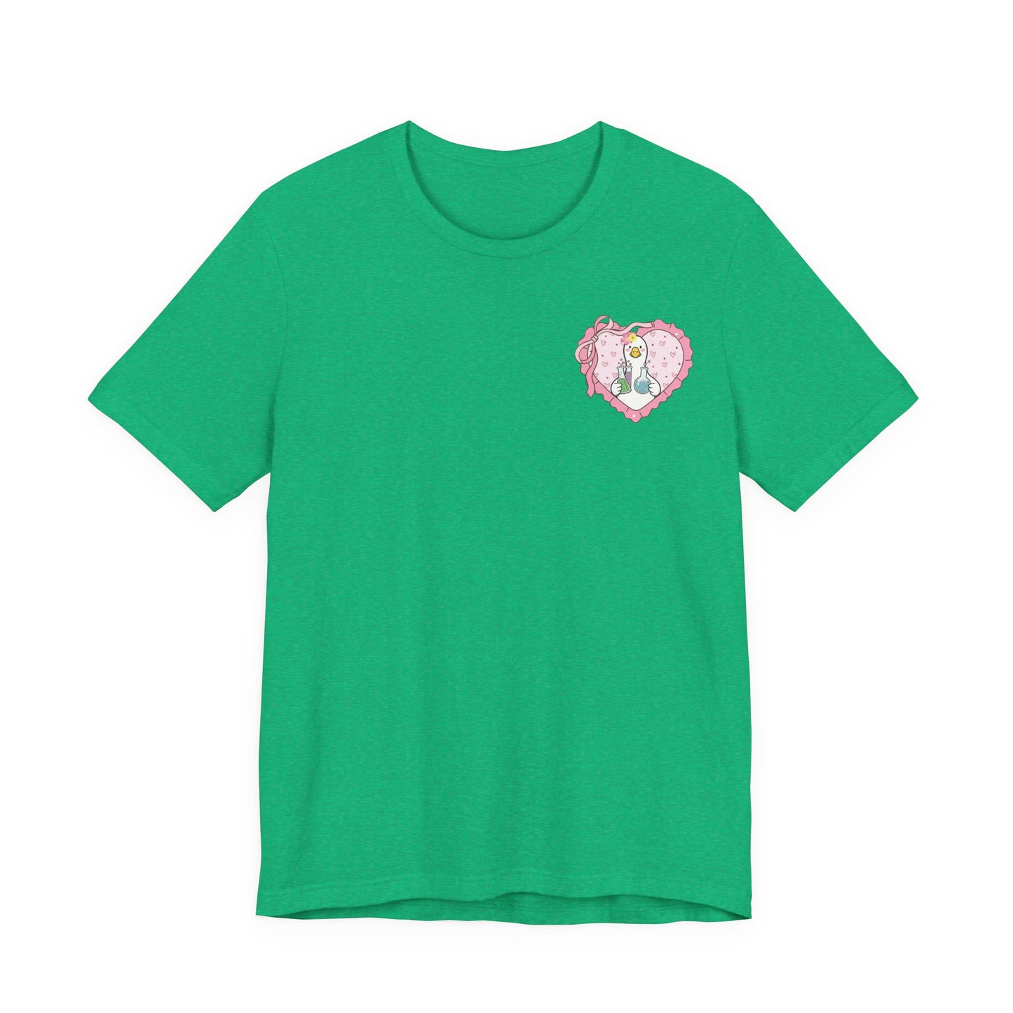 Bella + Canvas 3001 t-shirt in Heather Kelly featuring a coquette science teacher goose heart design on the left chest. White goose with laboratory beakers inside a pink heart with ribbon bow details. Ideal for science teachers, chemistry teachers, biology teachers, and teacher appreciation gifts.