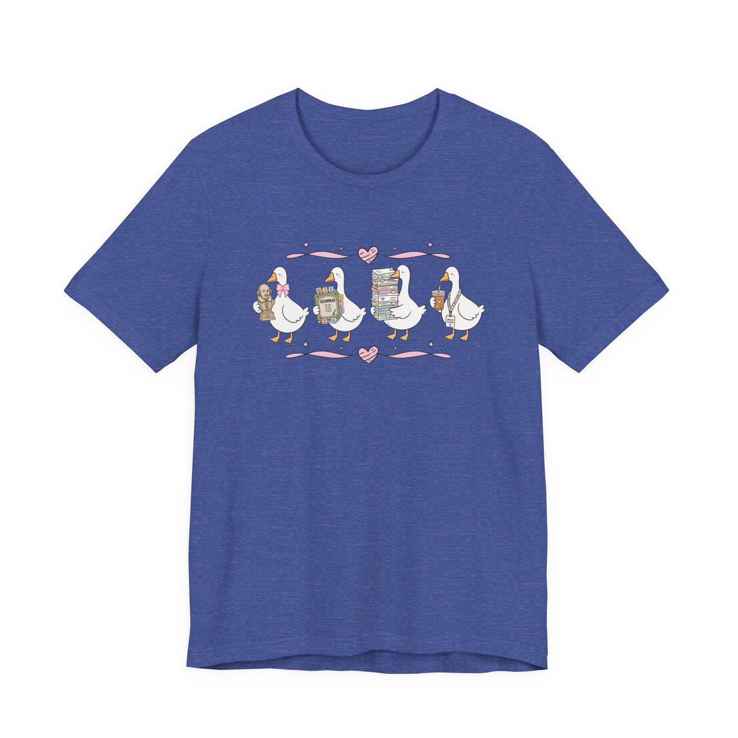 Bella + Canvas 3001 t-shirt in Heather True Royal featuring a coquette English teacher goose design. Four white geese carry a classic literature bust, a grammar book, a stack of books and papers, and an iced coffee with an English teacher lanyard. Pink hearts and ribbon accents add a whimsical touch, making this cute English teacher shirt perfect for back-to-school outfits, teacher appreciation gifts, and everyday classroom wear.