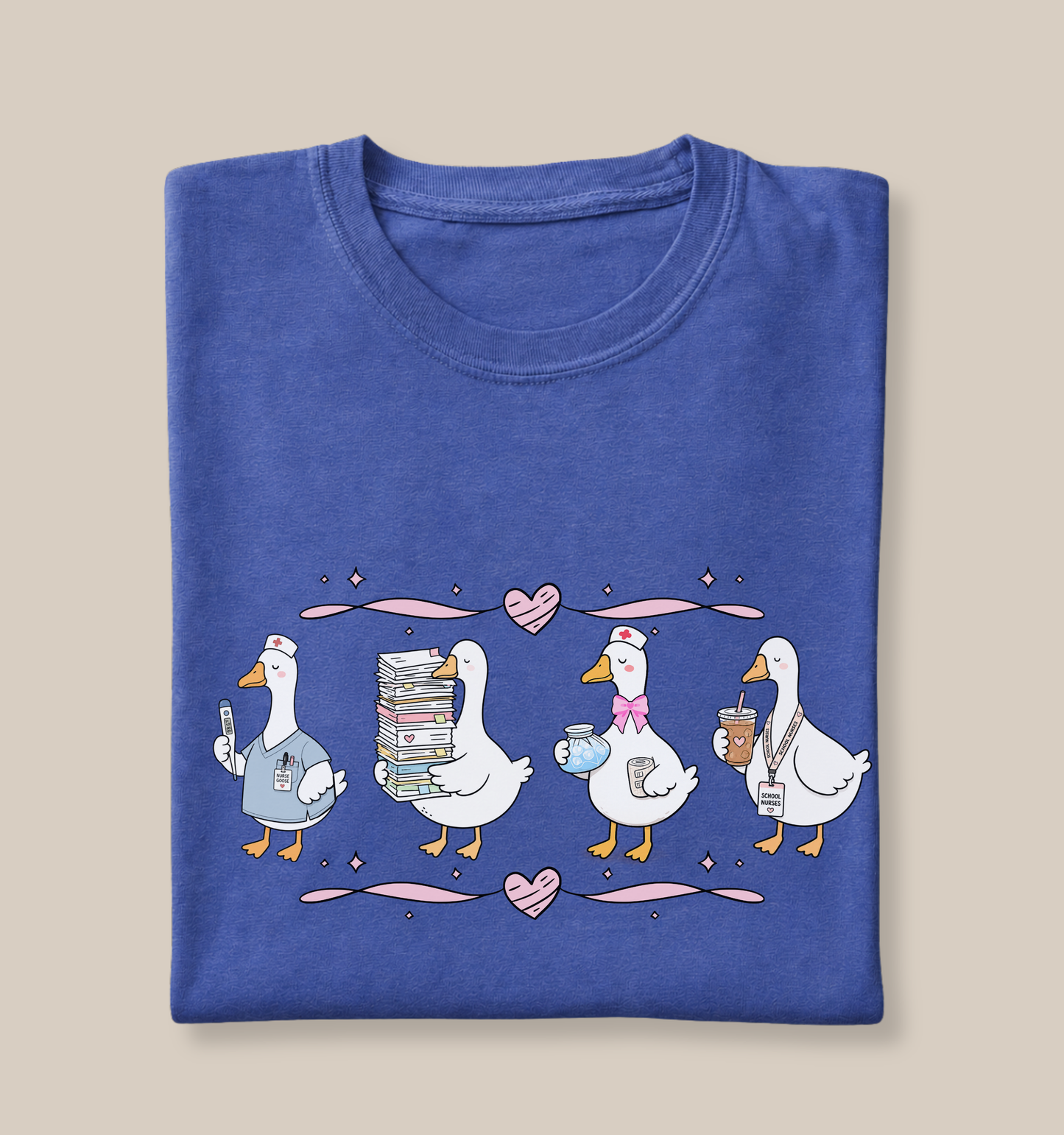 Bella + Canvas 3001 t-shirt in Heather True Royal featuring a coquette school nurse goose design. Four white geese display nurse-themed accessories including scrubs, a thermometer, medical supplies, paperwork, iced coffee, and a school nurse badge. Pink hearts and ribbon accents add a whimsical touch, making this cute school nurse shirt perfect for nurses, school health staff, nurse appreciation gifts, healthcare workers, and back-to-school outfits.