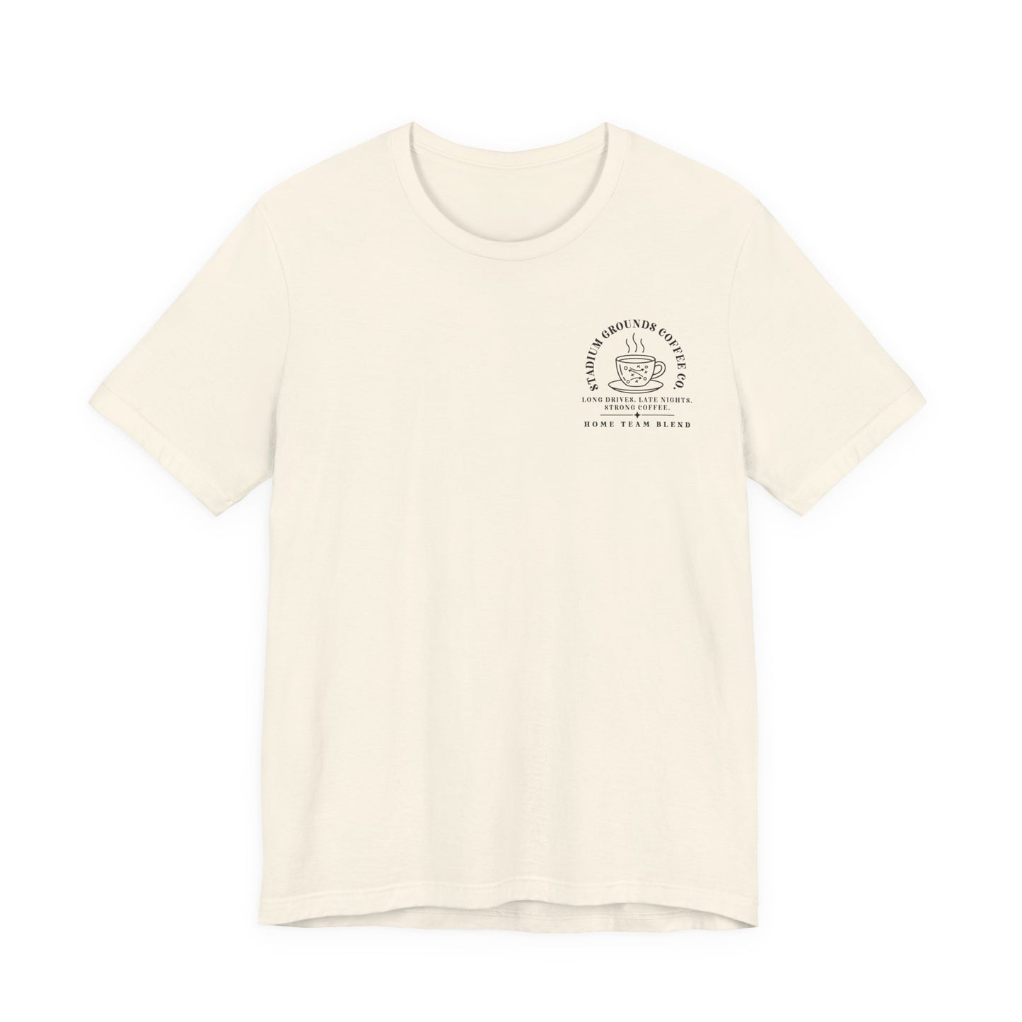 Bella + Canvas 3001 unisex t-shirt in Natural featuring a white pocket-style "Stadium Grounds Coffee Co." graphic with a football-themed coffee cup. The design reads "Long Drives. Late Nights. Strong Coffee. Home Team Blend," making it a great gift for football moms and tailgate enthusiasts.