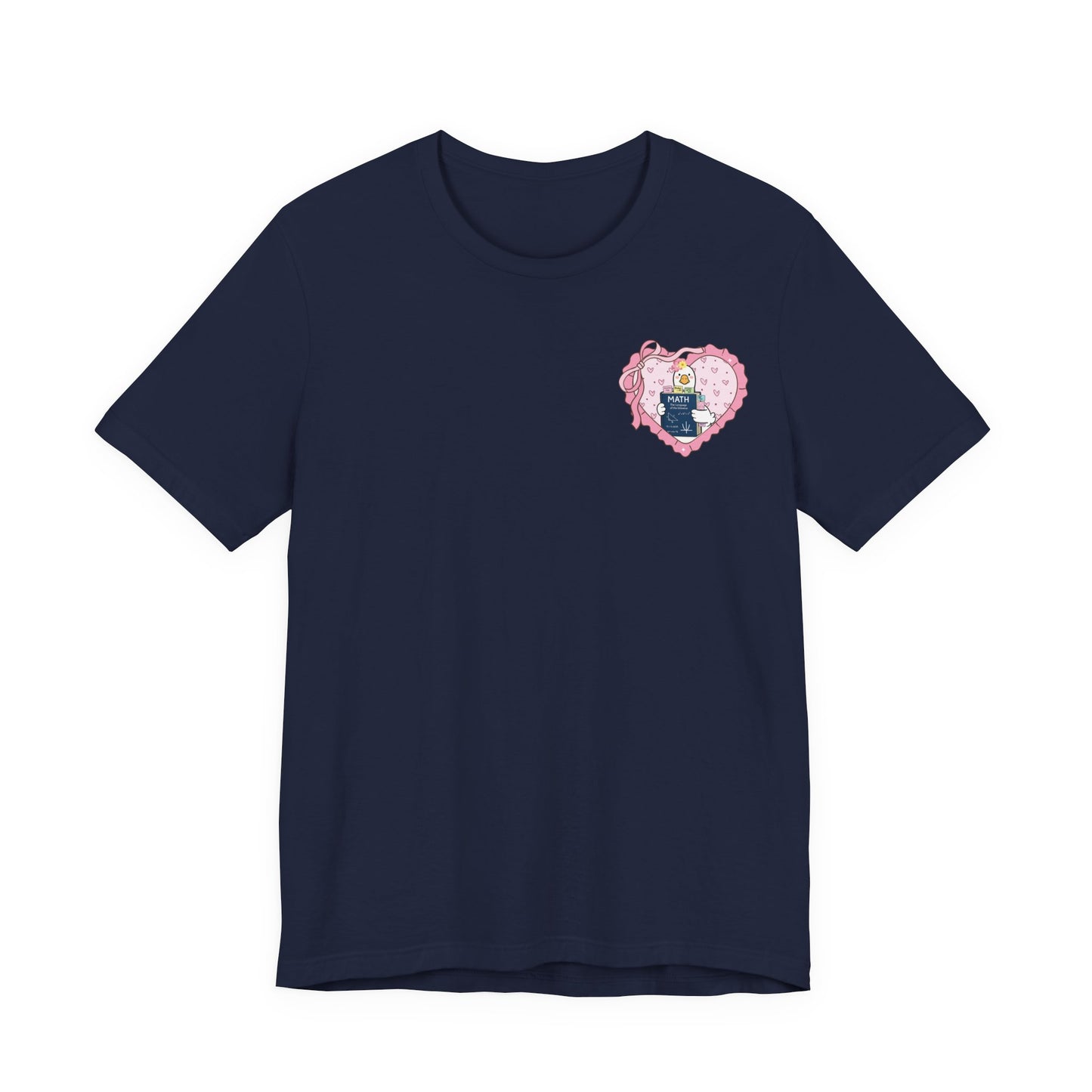 Bella + Canvas 3001 t-shirt in Navy featuring a coquette math teacher goose heart design on the left chest. The design shows a white goose holding a math textbook inside a pink heart with ribbon details. Ideal for math teachers, STEM educators, and teacher appreciation gifts.