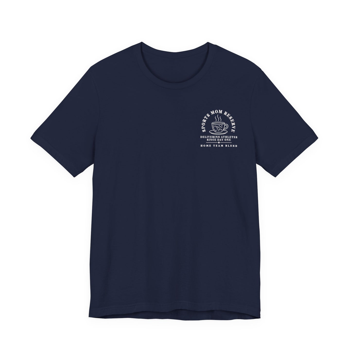 Bella + Canvas 3001 unisex t-shirt in Navy featuring the "Sports Mom Reserve Coffee Co." pocket graphic with a steaming coffee cup and the phrase "Delivering Athletes Since Day One – Home Team Blend." A fun sports mom shirt made for early mornings, late-night games, and endless coffee.