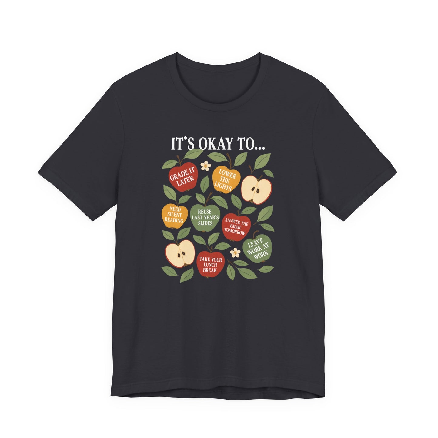 Bella + Canvas 3001 t-shirt in dark grey featuring colorful apple illustrations with teacher self care sayings including “Lower the Lights,” “Need Silent Reading,” and “Leave Work at Work.”