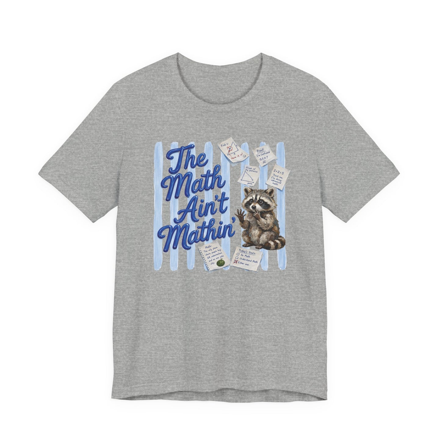 Bella + Canvas 3001 t-shirt in athletic heather gray featuring the phrase “The Math Ain’t Mathin’” in blue script lettering with a confused raccoon surrounded by math equations, geometry diagrams, classroom notes, and worksheets. Funny math teacher shirt for algebra teachers, geometry teachers, middle school educators, high school math teachers, tutors, and STEM professionals who appreciate math humor and classroom chaos.