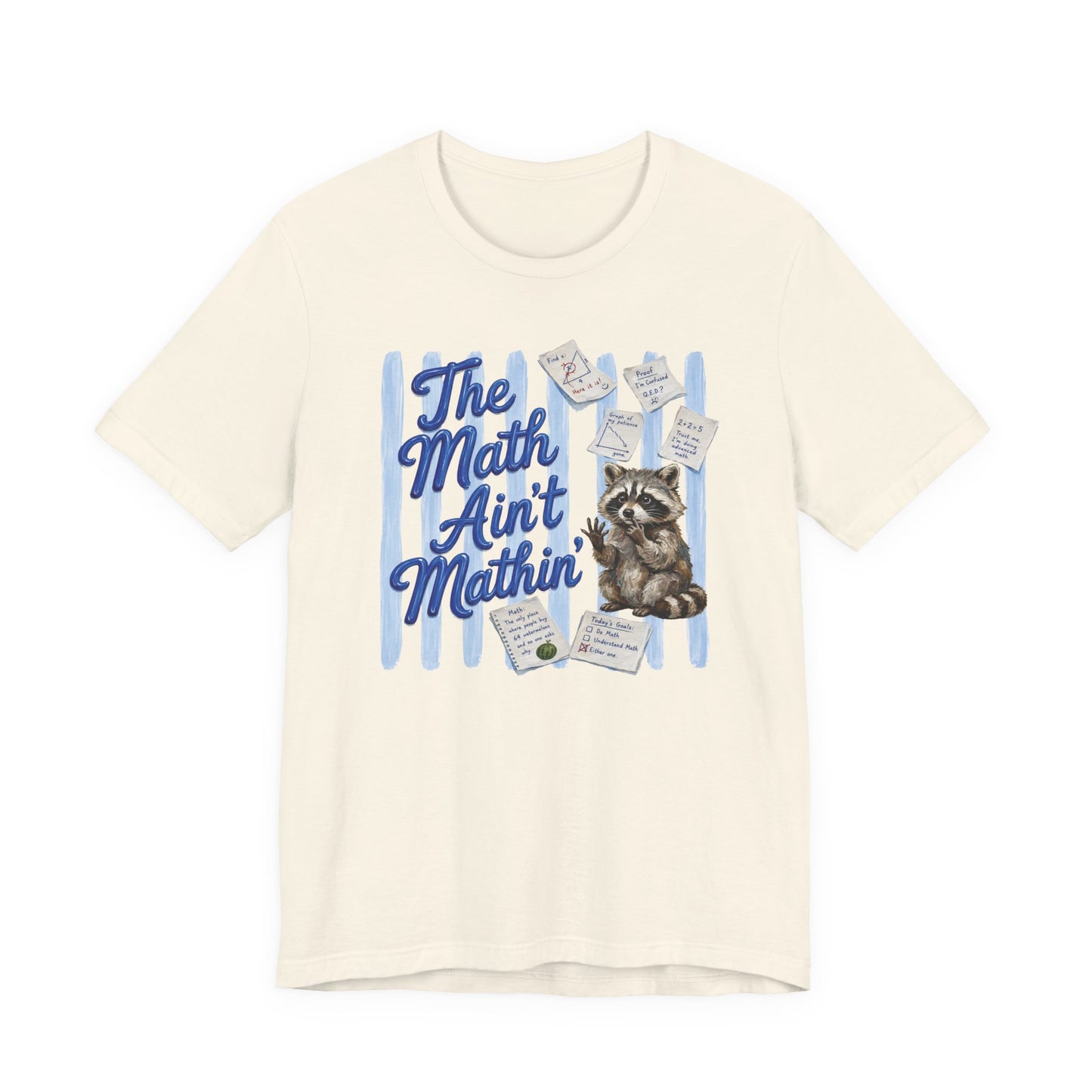 Bella + Canvas 3001 t-shirt in natural featuring the phrase “The Math Ain’t Mathin’” in bold blue lettering with a confused raccoon surrounded by math notes, equations, geometry sketches, and classroom worksheets. Funny math teacher shirt for algebra teachers, geometry teachers, middle school educators, high school math teachers, tutors, and STEM instructors who appreciate relatable classroom humor.