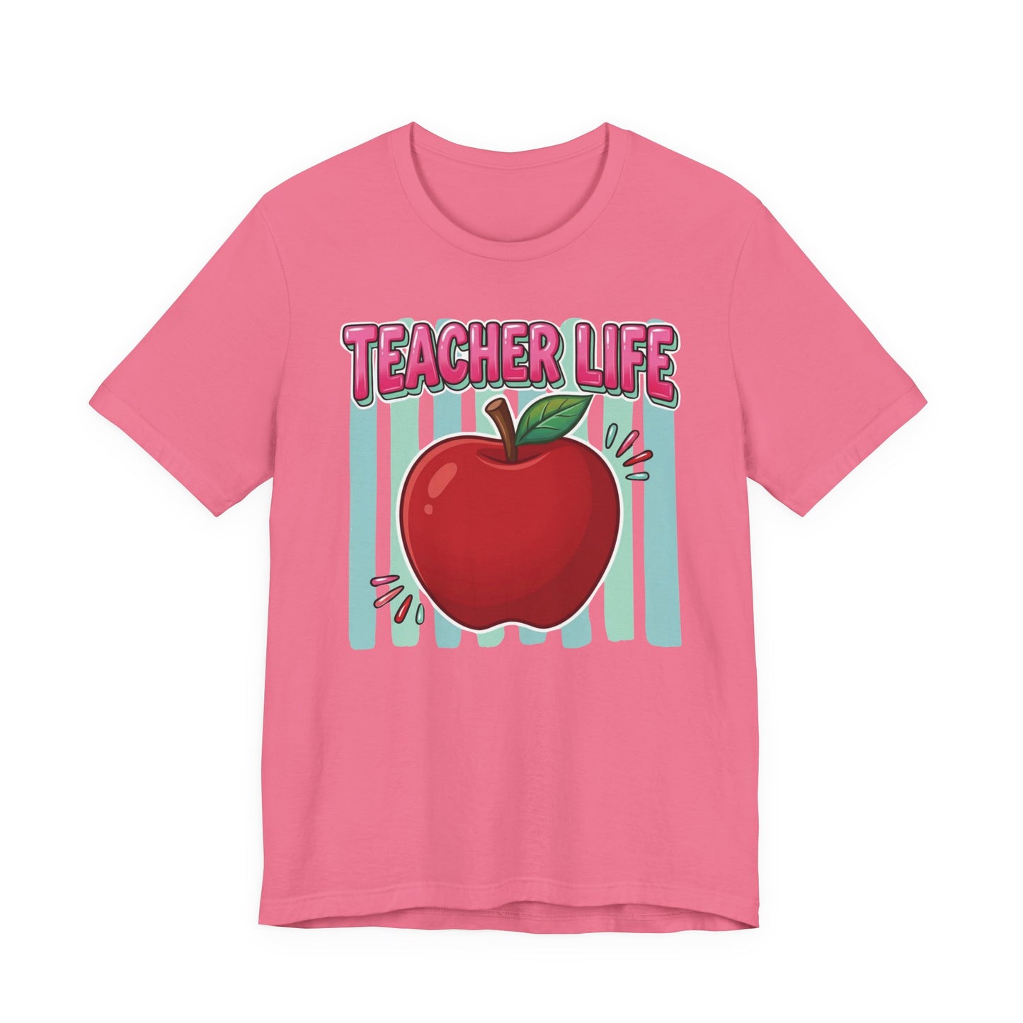 Bella + Canvas 3001 unisex t-shirt in charity pink featuring a colorful Teacher Life design with a bright red apple, pink retro lettering, and teal striped background. Cheerful teacher shirt displayed on a soft pink tee against a clean white background.