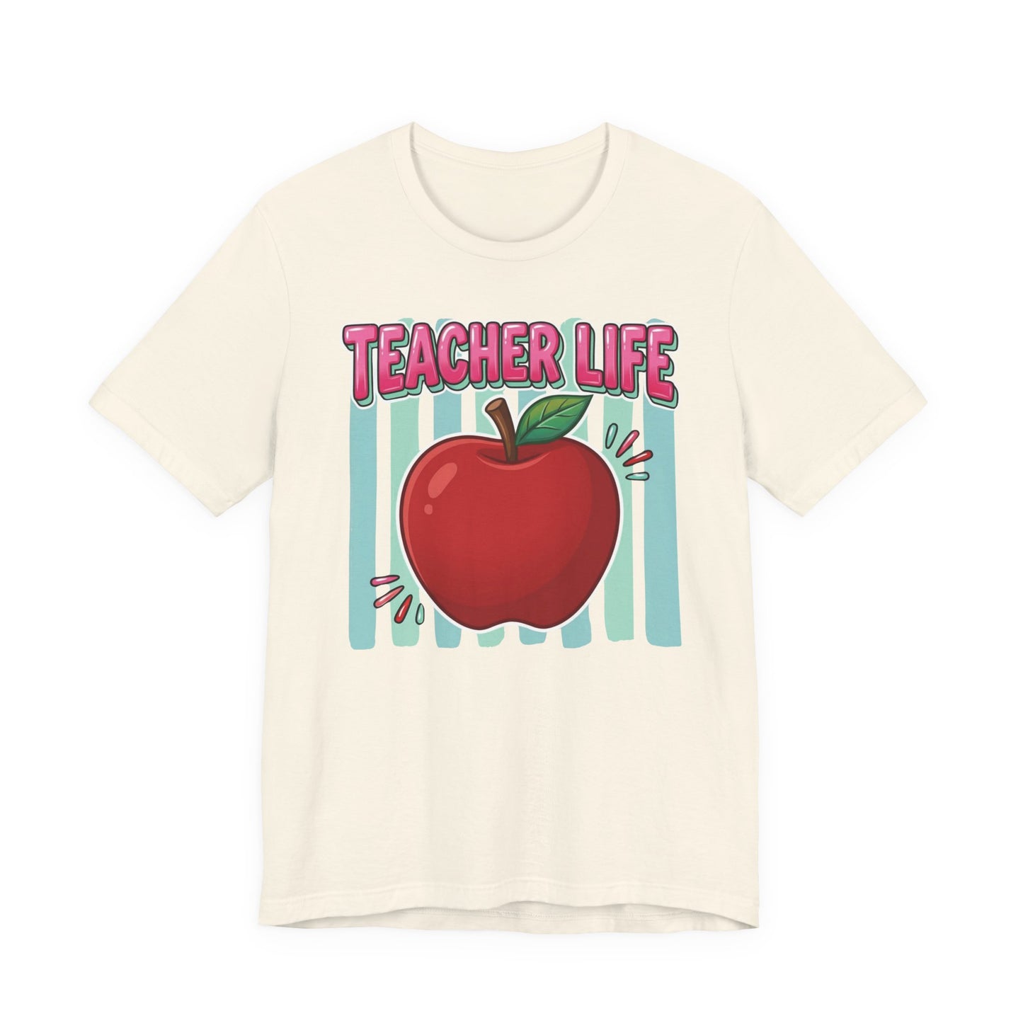 Bella + Canvas 3001 unisex t-shirt in natural featuring a colorful Teacher Life design with a bright red apple, pink retro lettering, and teal striped background. Cheerful teacher shirt displayed on a natural cream-colored tee against a clean white background.