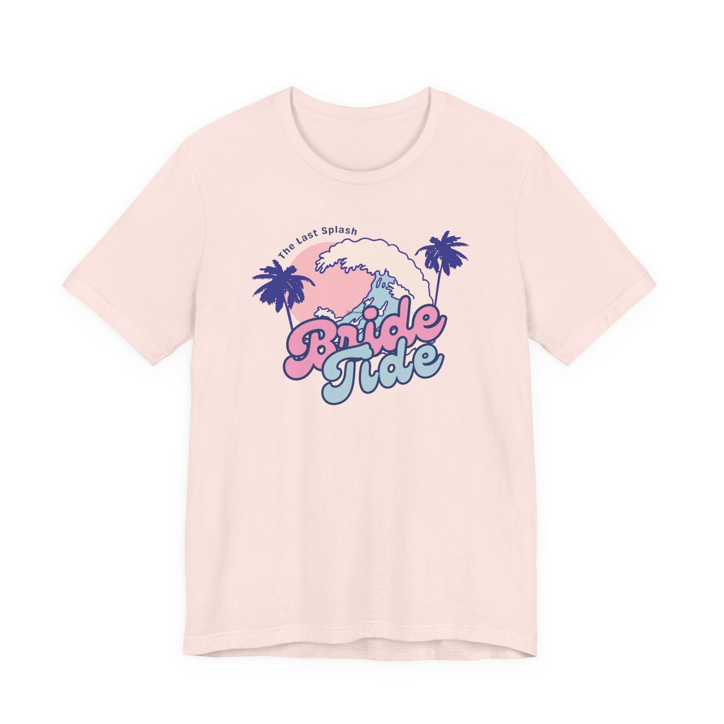 Bella + Canvas 3001 t-shirt in soft pink featuring a retro beach bachelorette design with pink and blue “Bride Tribe” lettering, palm trees, ocean waves, and tropical sunset artwork for a beach bachelorette party or bridal getaway.