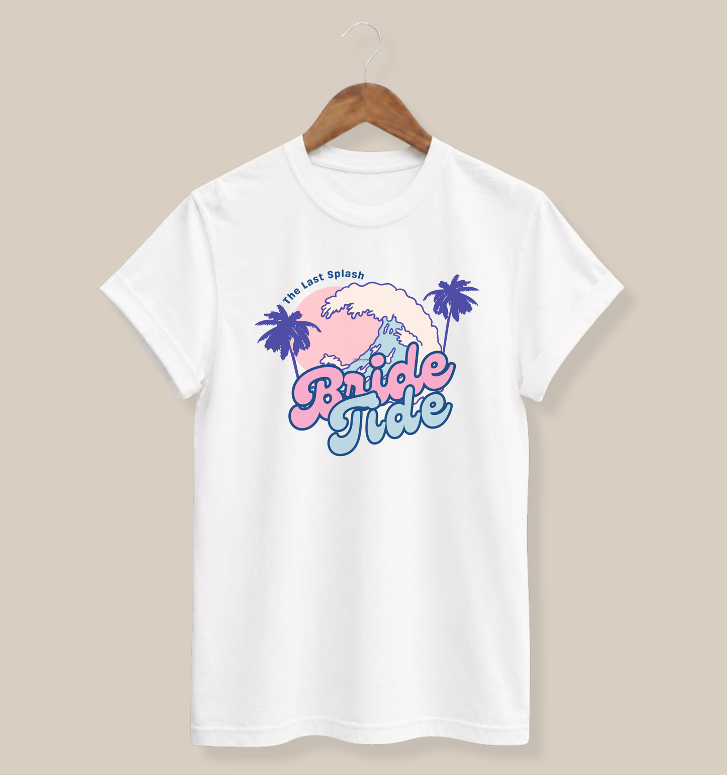 Bella + Canvas 3001 t-shirt in white featuring a retro beach bachelorette design with palm trees, ocean waves, sunset artwork, and “Bride Tribe” wording in pink and blue tropical lettering.