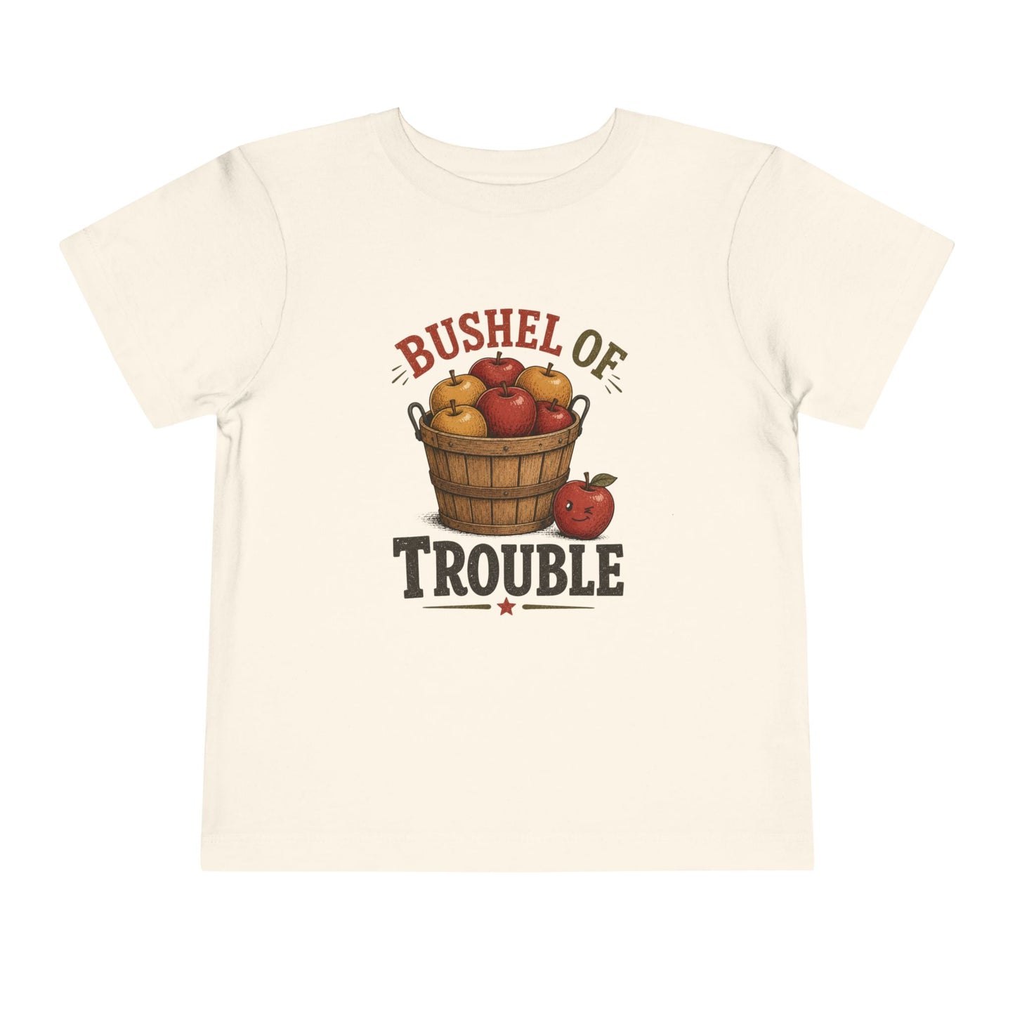 Natural toddler T-shirt featuring a vintage basket of apples and the playful phrase “Bushel of Trouble.”