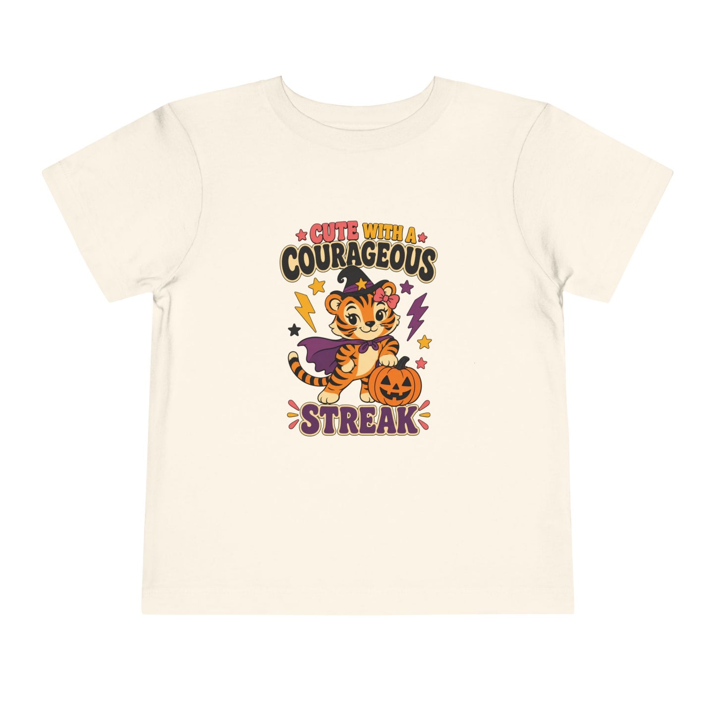 Natural toddler T-shirt featuring a costumed tiger, purple cape, pumpkin, lightning bolts, and the phrase “Cute With a Courageous Streak.”