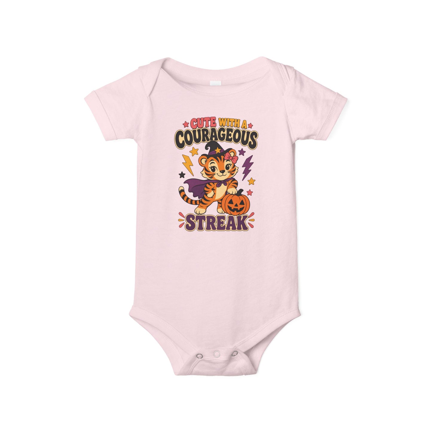 Pink color baby one piece featuring a tiger dressed as a witch, a jack-o’-lantern, colorful stars, and the phrase “Cute With a Courageous Streak.”