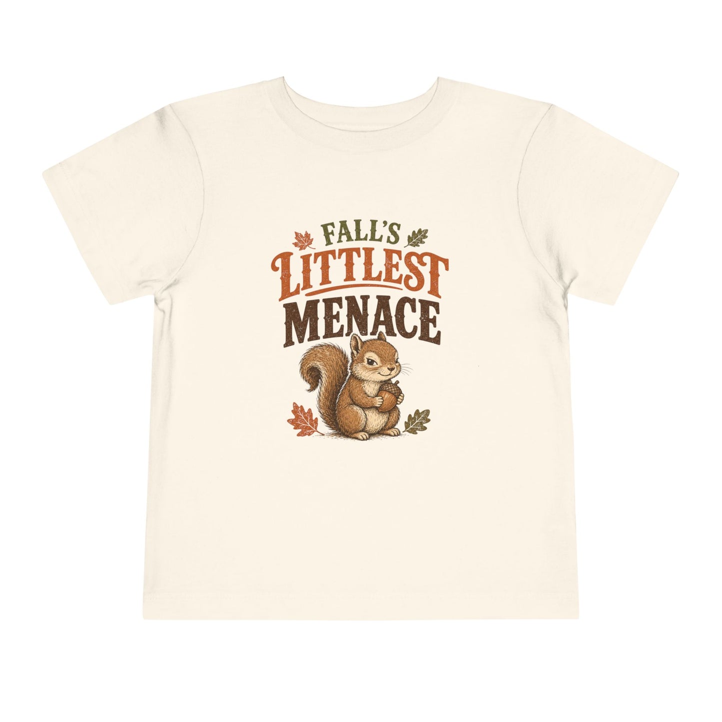 An off-white short-sleeve t-shirt with a graphic print of a squirrel and the text 'FALL'S LITTLEST MENACE' in autumn colors, displayed on a solid white background.