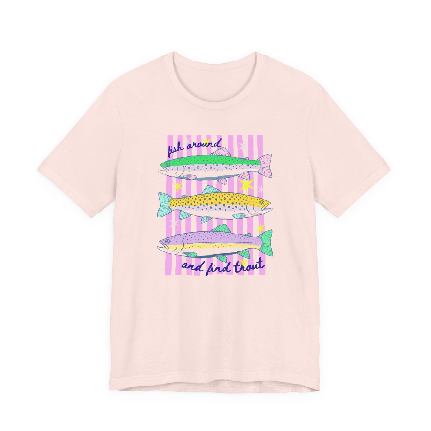 Soft pink Bella + Canvas 3001 t-shirt featuring a colorful fishing graphic with three illustrated trout, pink striped accents, and the phrase “Fish Around and Find Trout.”