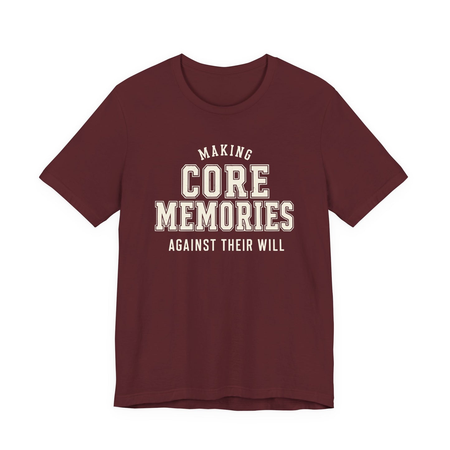 Maroon adult T-shirt featuring bold collegiate-style typography with the sarcastic parenting saying “Making Core Memories Against Their Will.”