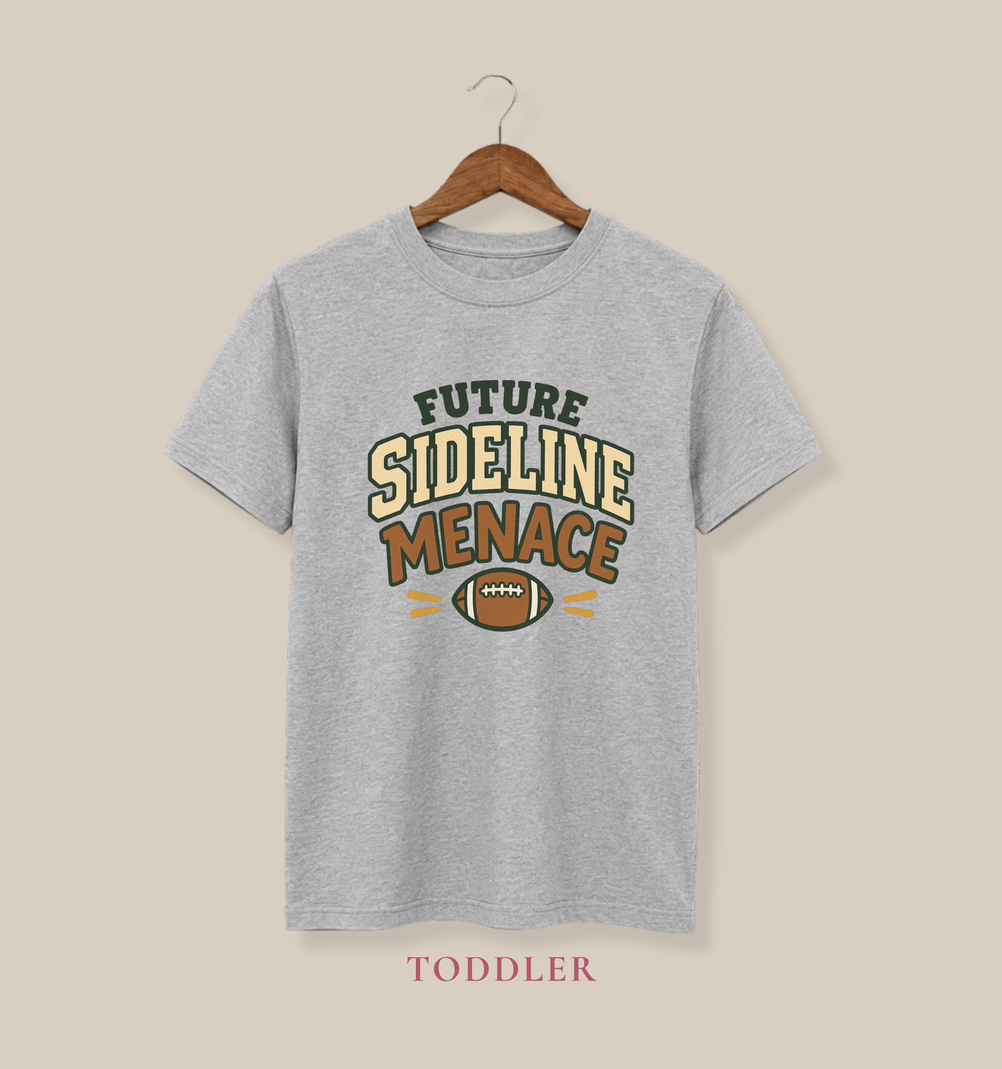 Athletic heather grey toddler T-shirt featuring a football graphic and the playful phrase “Future Sideline Menace.”