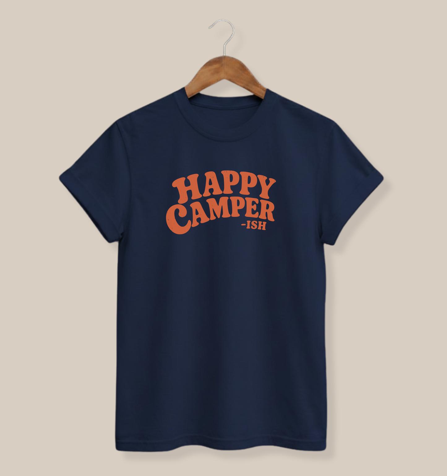 Navy adult T-shirt featuring a lightly distressed orange design and the sarcastic outdoor saying “Happy Camper-ish.”