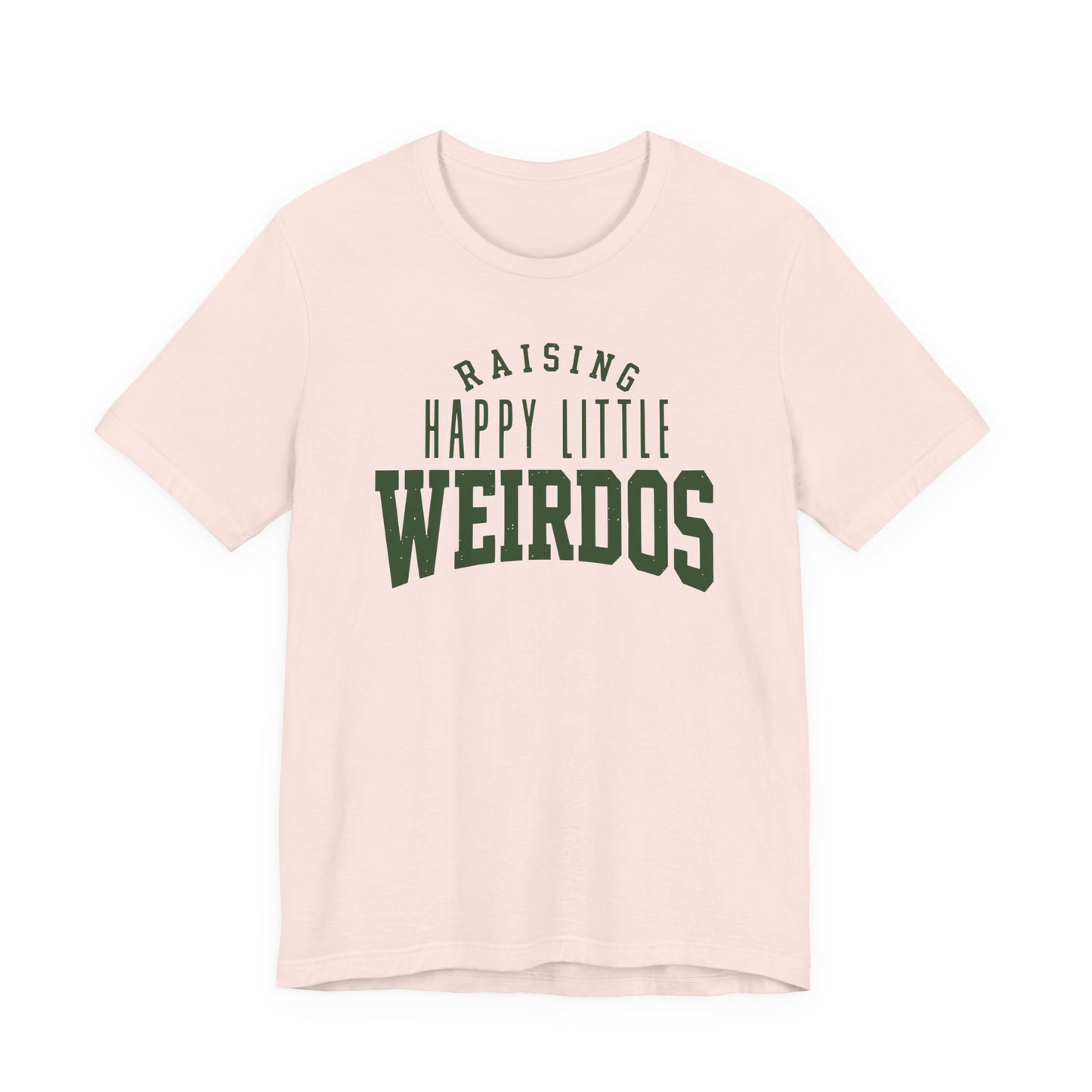 Soft pink adult T-shirt featuring bold collegiate-style typography with the humorous saying “Raising Happy Little Weirdos.”