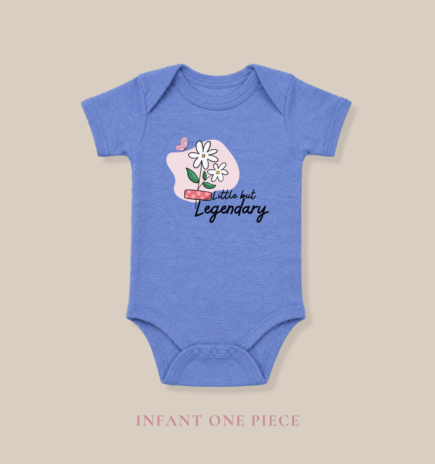 True royal blue baby one piece featuring white daisies, a pink butterfly, and the empowering phrase “Little but Legendary.”