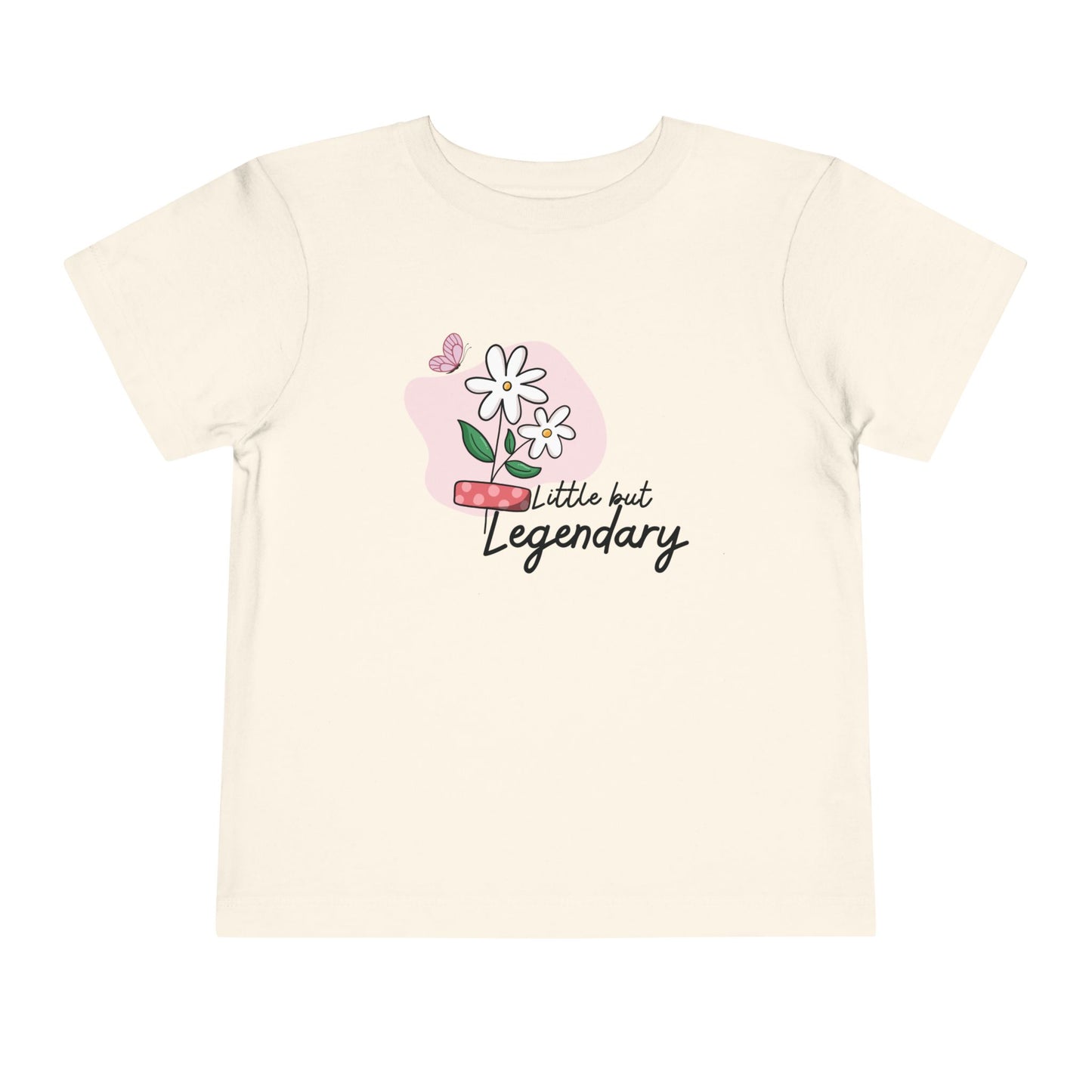 Natural toddler T-shirt featuring daisies, a pink bandage, a butterfly, and the phrase “Little but Legendary.”