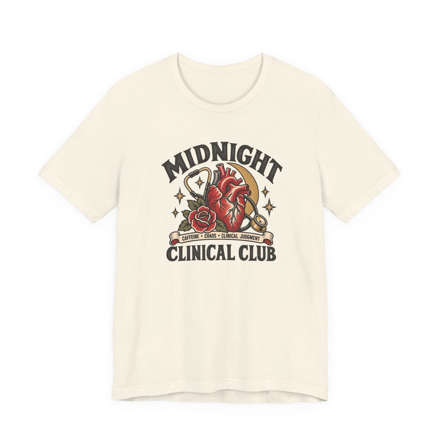 Natural classic fit tee featuring a tattoo-inspired Midnight Clinical Club design with an anatomical heart, stethoscope, moon, and red rose.