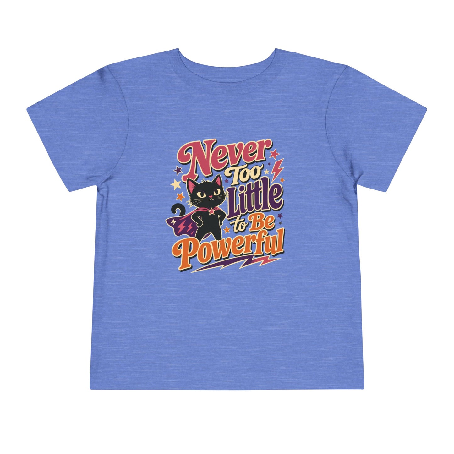 Heather Columbia blue toddler T-shirt featuring a caped black cat, colorful stars and lightning bolts, and the phrase “Never Too Little to Be Powerful.”