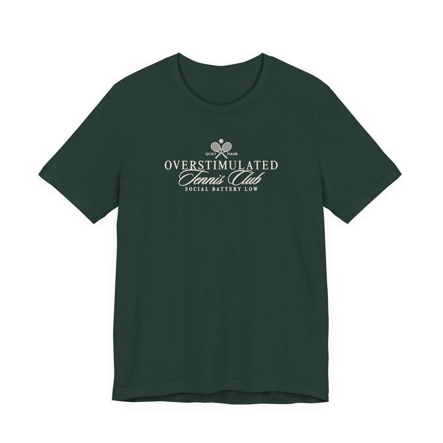 Forest green Bella + Canvas 3001 t-shirt featuring a minimalist “Overstimulated Tennis Club” graphic with crossed tennis rackets and the phrase “Social Battery Low” in cream lettering.