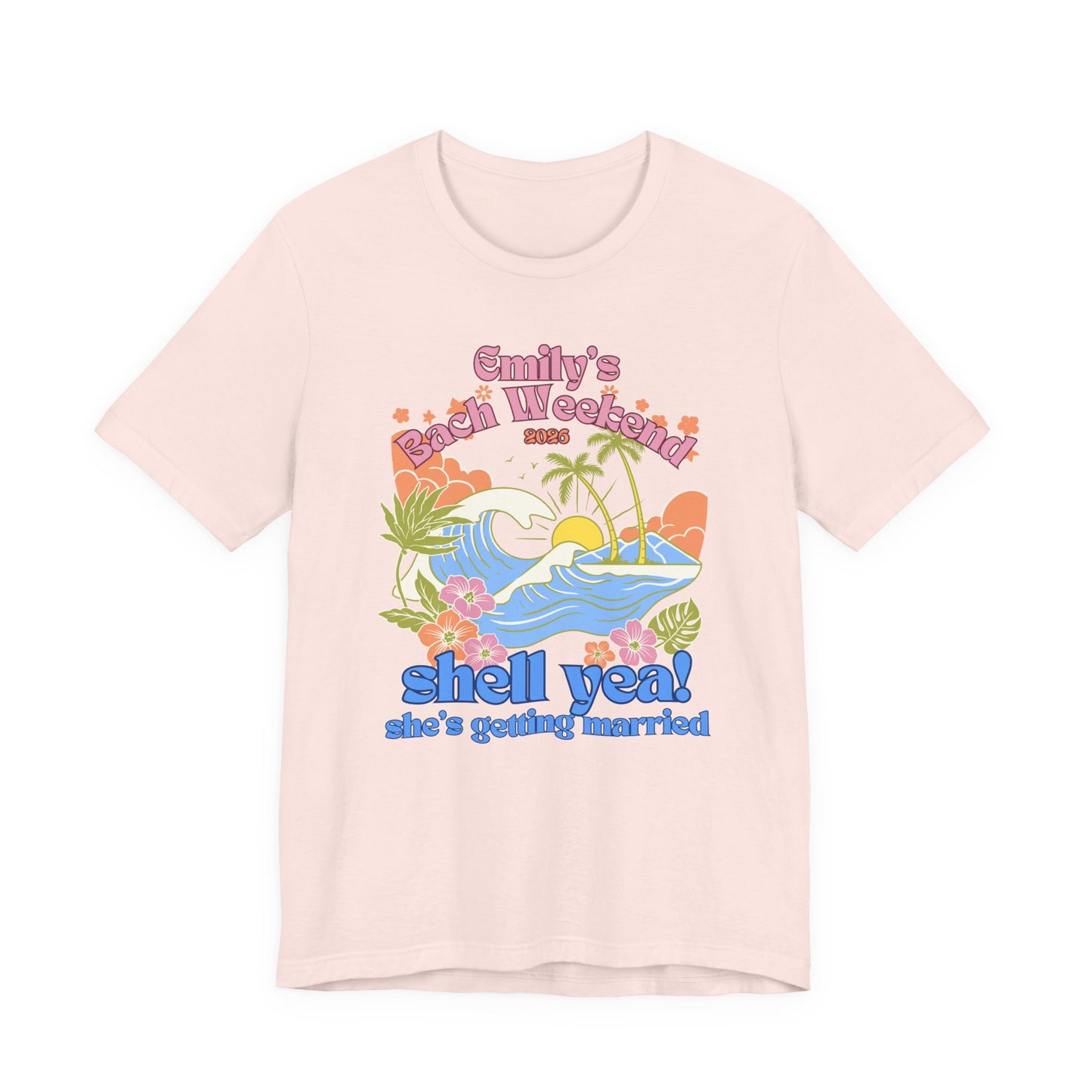 Bella + Canvas 3001 t-shirt in soft pink featuring a personalized tropical bachelorette party design with ocean waves, palm trees, hibiscus flowers, custom bride name, bach weekend text, and “Shell Yeah! She’s Getting Married” slogan in colorful retro lettering.