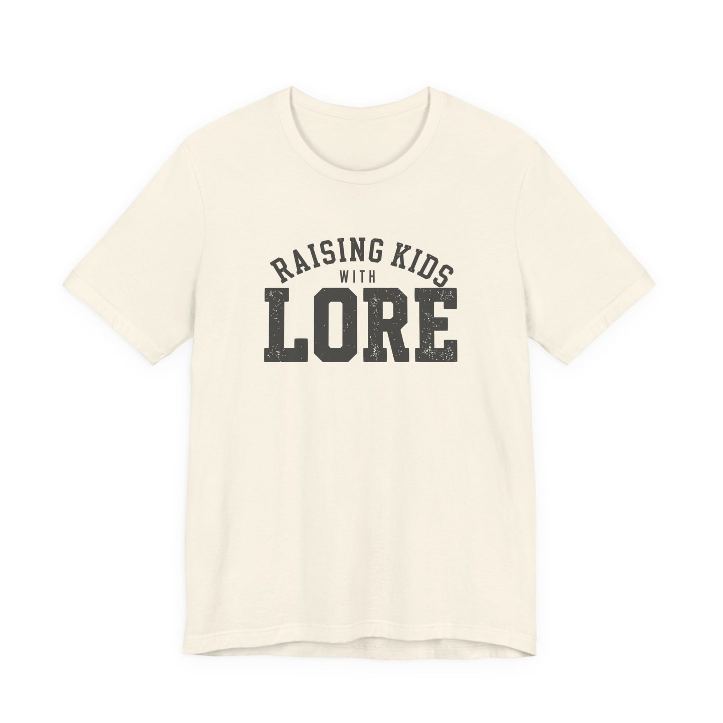 Natural adult T-shirt featuring distressed charcoal varsity lettering and the playful phrase “Raising Kids With Lore.”