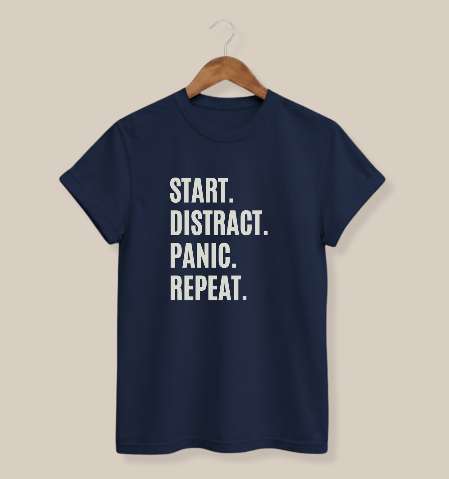 Navy classic fit T-shirt displaying a cream Start Distract Panic Repeat graphic for funny ADHD and procrastination humor.