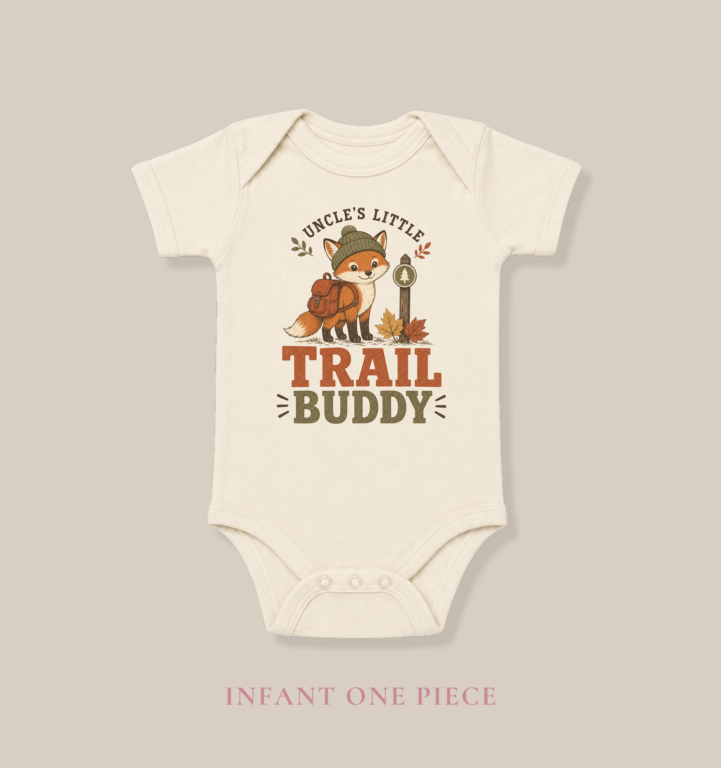 Natural baby one piece featuring a fox in hiking gear, autumn leaves, and the phrase “Uncle’s Little Trail Buddy.”