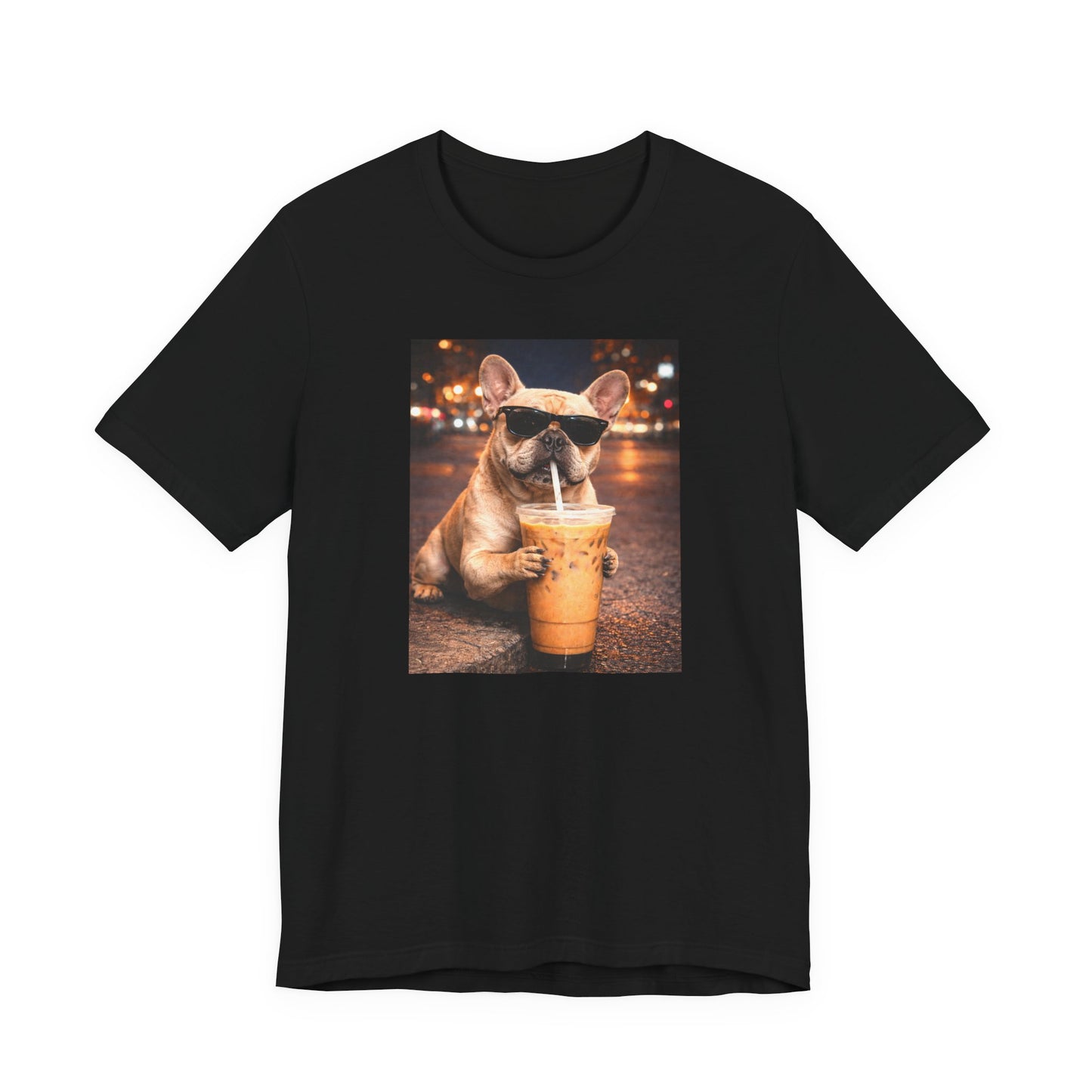 black graphic t-shirt featuring a french bulldog in sunglasses holding iced coffee against a blurred city night background