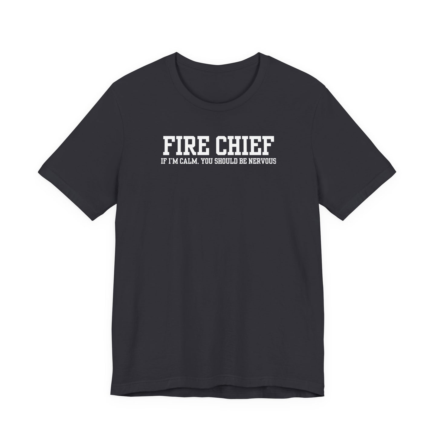 dark grey Bella Canvas t-shirt with “Fire Chief If I’m Calm You Should Be Nervous” text printed on front, isolated on white background