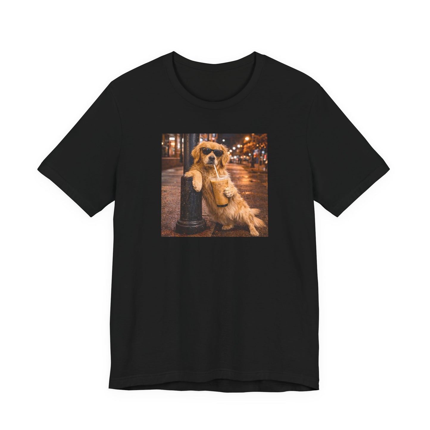 black graphic tee featuring a golden retriever in sunglasses leaning on a post while holding an iced coffee on a city street at night